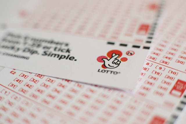 Four players matched all six main numbers to share the top prize of £4 million, receiving £1 million each, while five matched five numbers and the bonus ball to also win £1 million each (Yui Mok/PA)