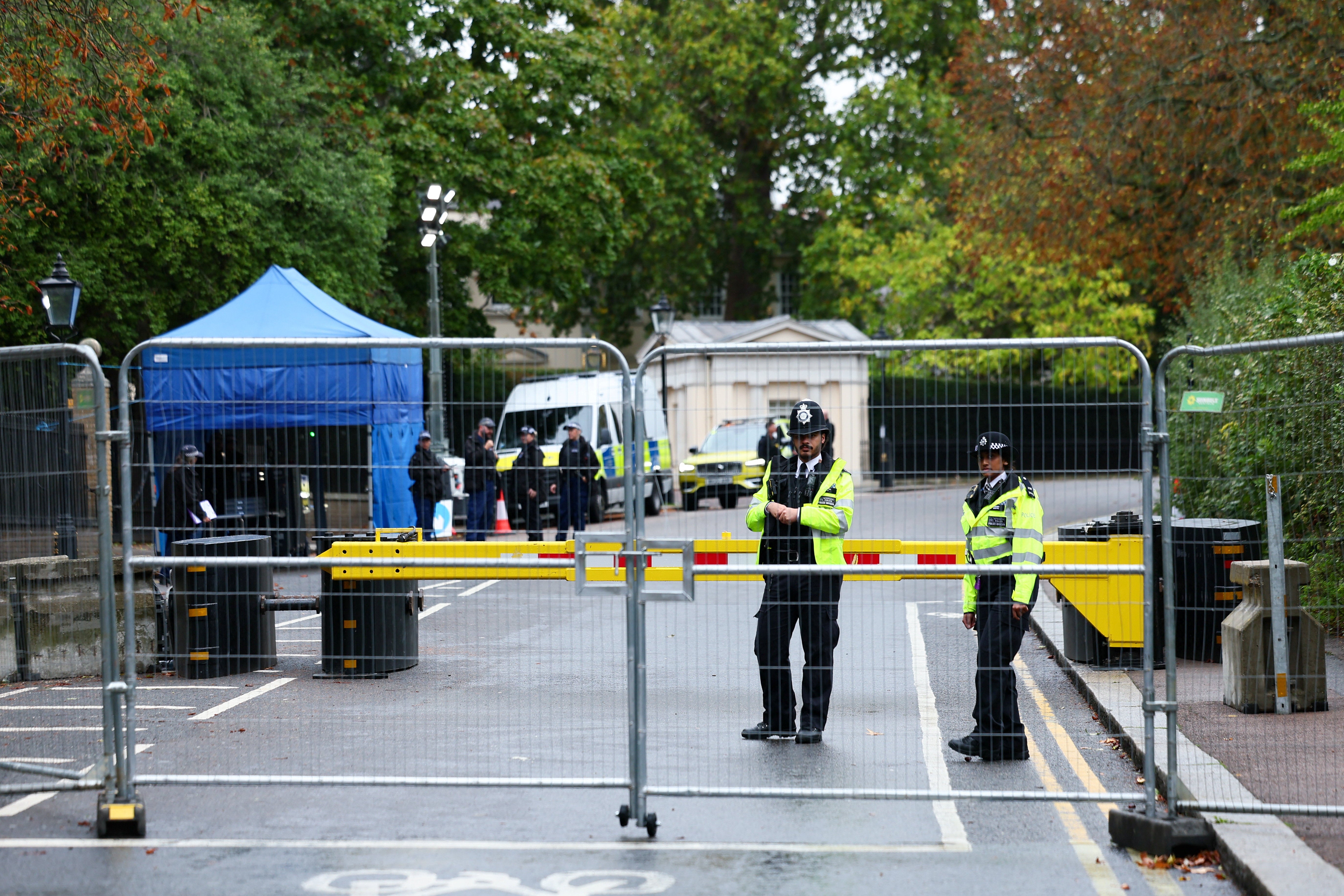 Police officer stands outside the Vinfield House, residence of US Ambassador