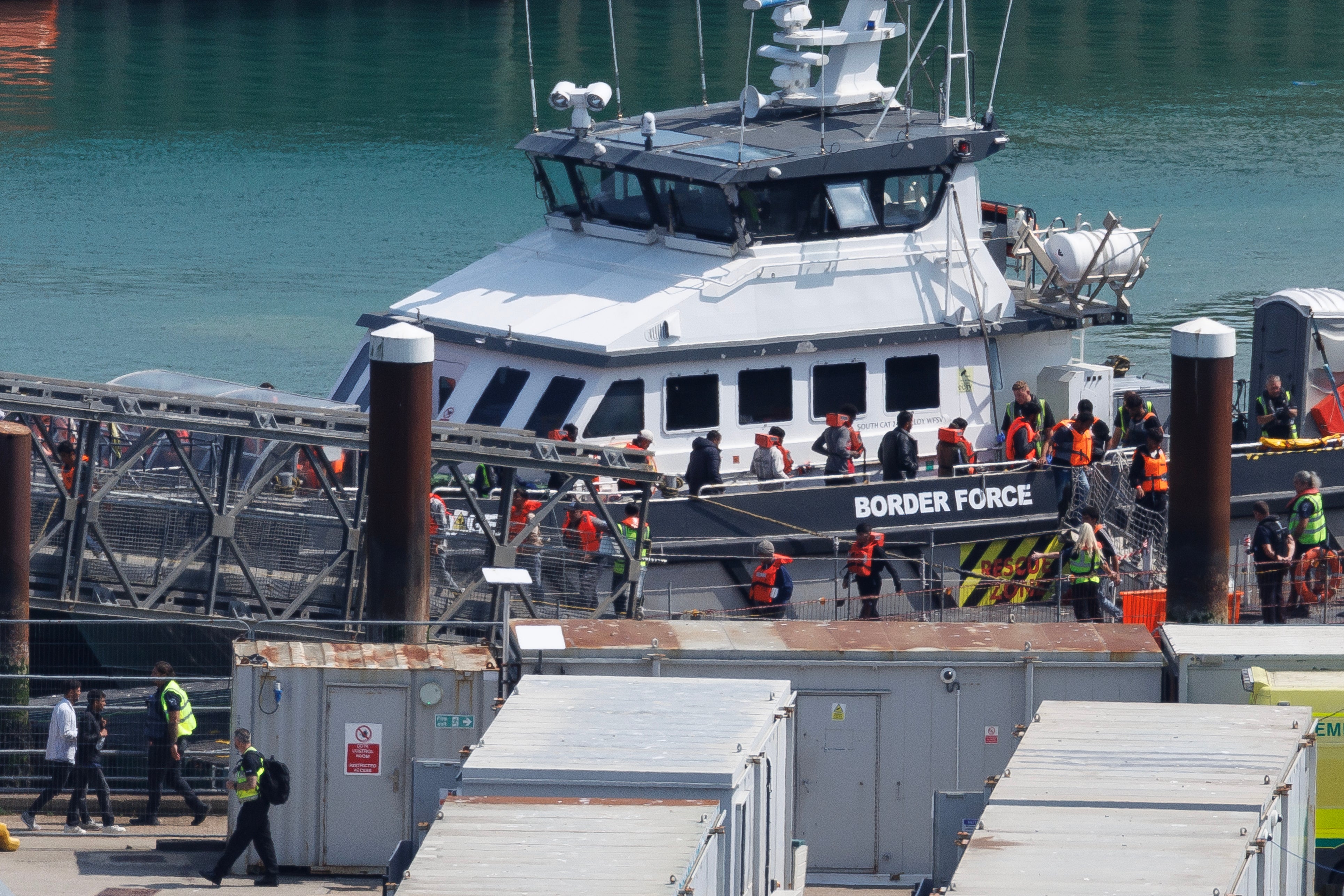 The UK Border Force vessel Ranger brings migrants into Dover port who were intercepted crossing the English Channel on 6 August