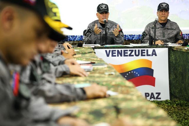 <p>Venezuela’s defence minister Vladimir Padrino (left) speaking in a meeting with the Military High Command in Caracas</p>