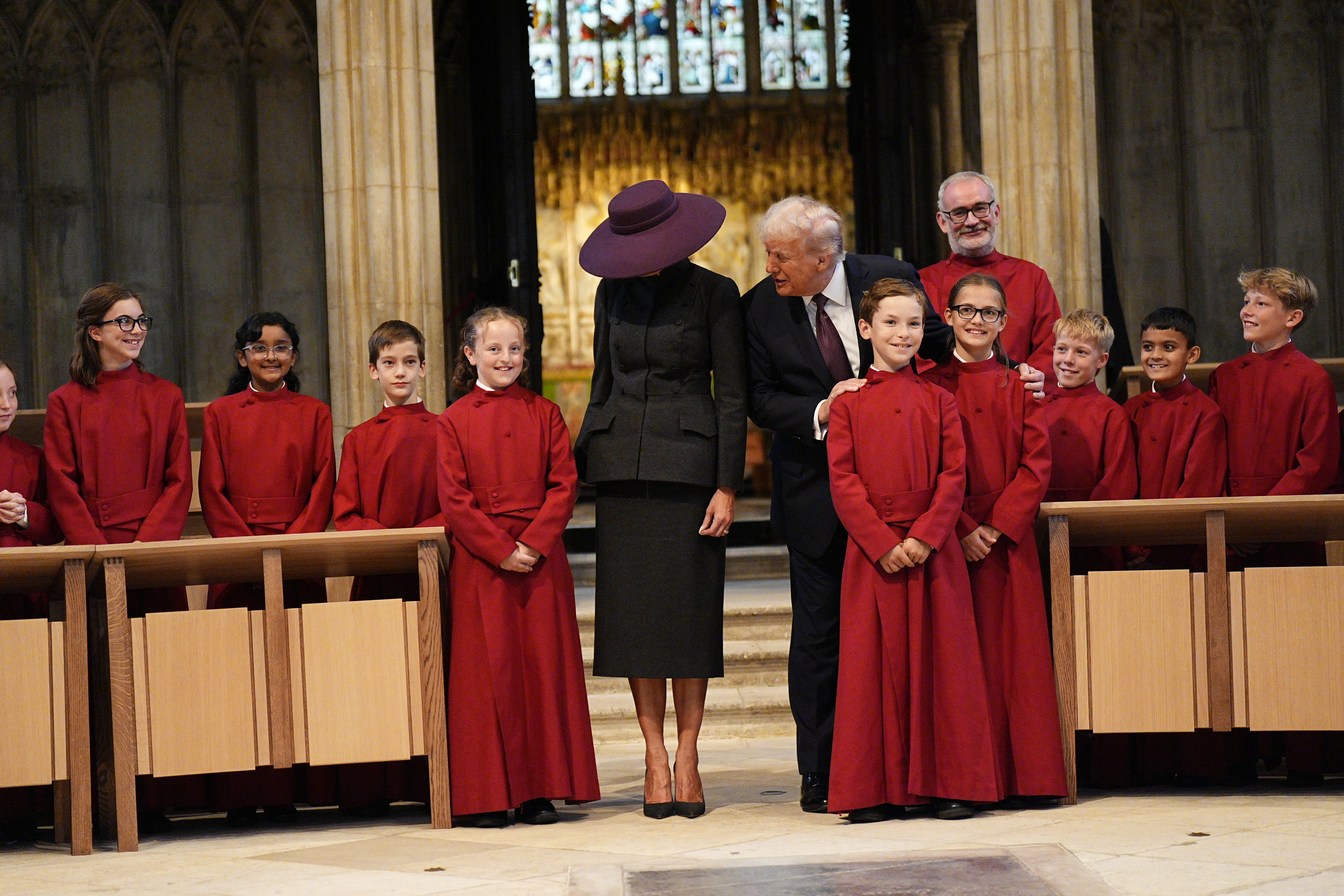 Melania’s plum hat evoked intrigue