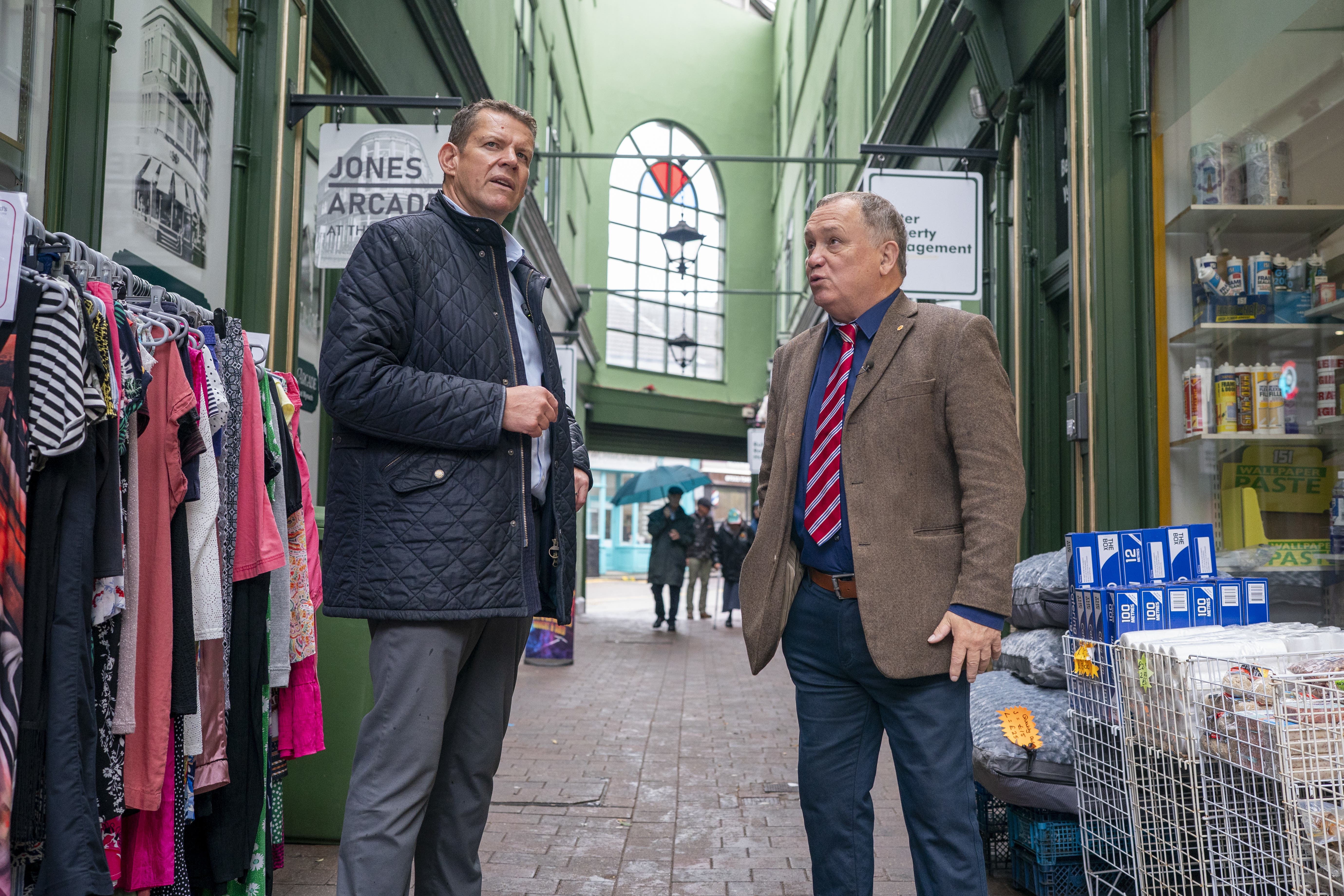 Plaid Cymru leader Rhun ap Iorwerth with Plaid Cymru candidate Lindsay Whittle as they visit local businesses on Ystrad Mynach high street within the Caerffili constituency (Ben Birchall/PA)