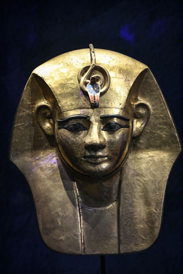 <p>The Gilded Wooden Mask from the coffin of Amenemope displayed prior to the opening of Ramses II exhibition at the Grande Halle de La Villette in Paris</p>