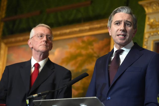 Secretary of State for Northern Ireland Hilary Benn and Tanaiste Simon Harris speak to media during a press conference at the British-Irish Intergovernmental Conference (BIIGC) at Hillsborough Castle, Co Down in April (Brian Lawless/PA)