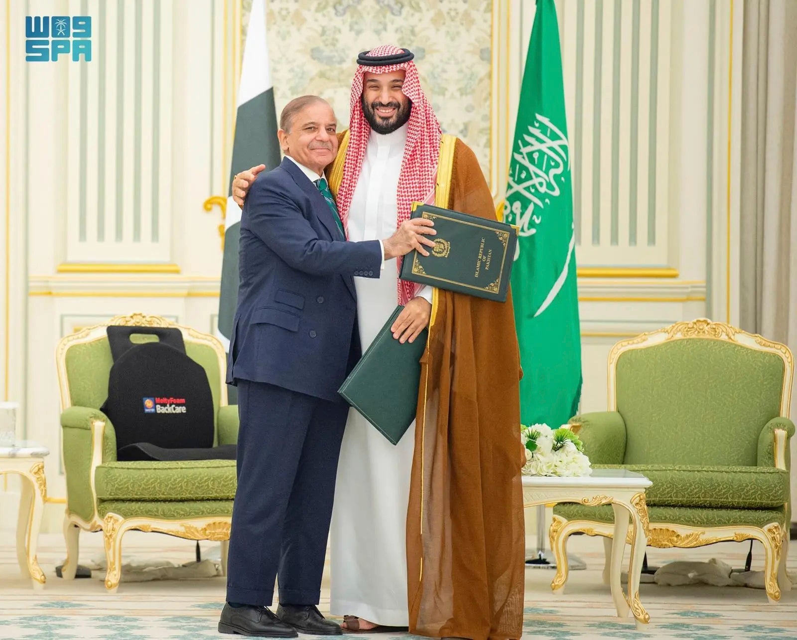 Pakistani Prime Minister Shehbaz Sharif, left, embraces Saudi Arabia's Crown Prince Mohammed bin Salman after signing a joint defense pact in Riyadh on Wednesday
