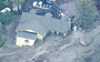 Mudslide buries houses and cars after heavy rain in California