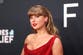 Taylor Swift fans queue for hours to get tickets to her album release party as AMC app crashes