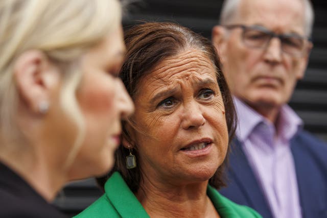 Sinn Fein president Mary Lou McDonald TD (centre), with First Minister Michelle O’Neill (left) and Gerry Kelly MLA (right), speaking to the media outside the Sinn Fein offices in Belfast (Liam McBurney/PA)