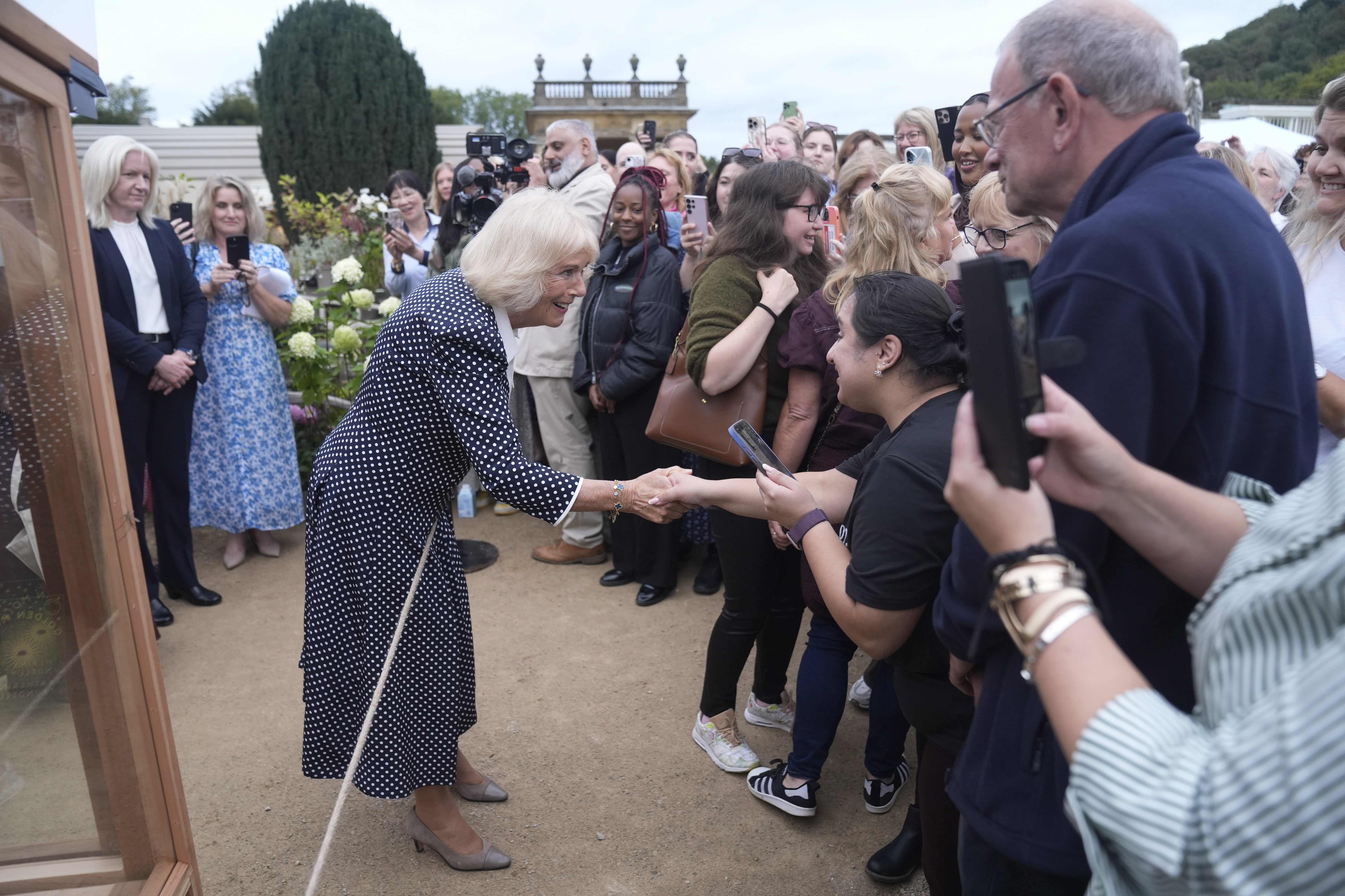 <p>Camilla met members of the public on the lawns of Chatsworth House </p>