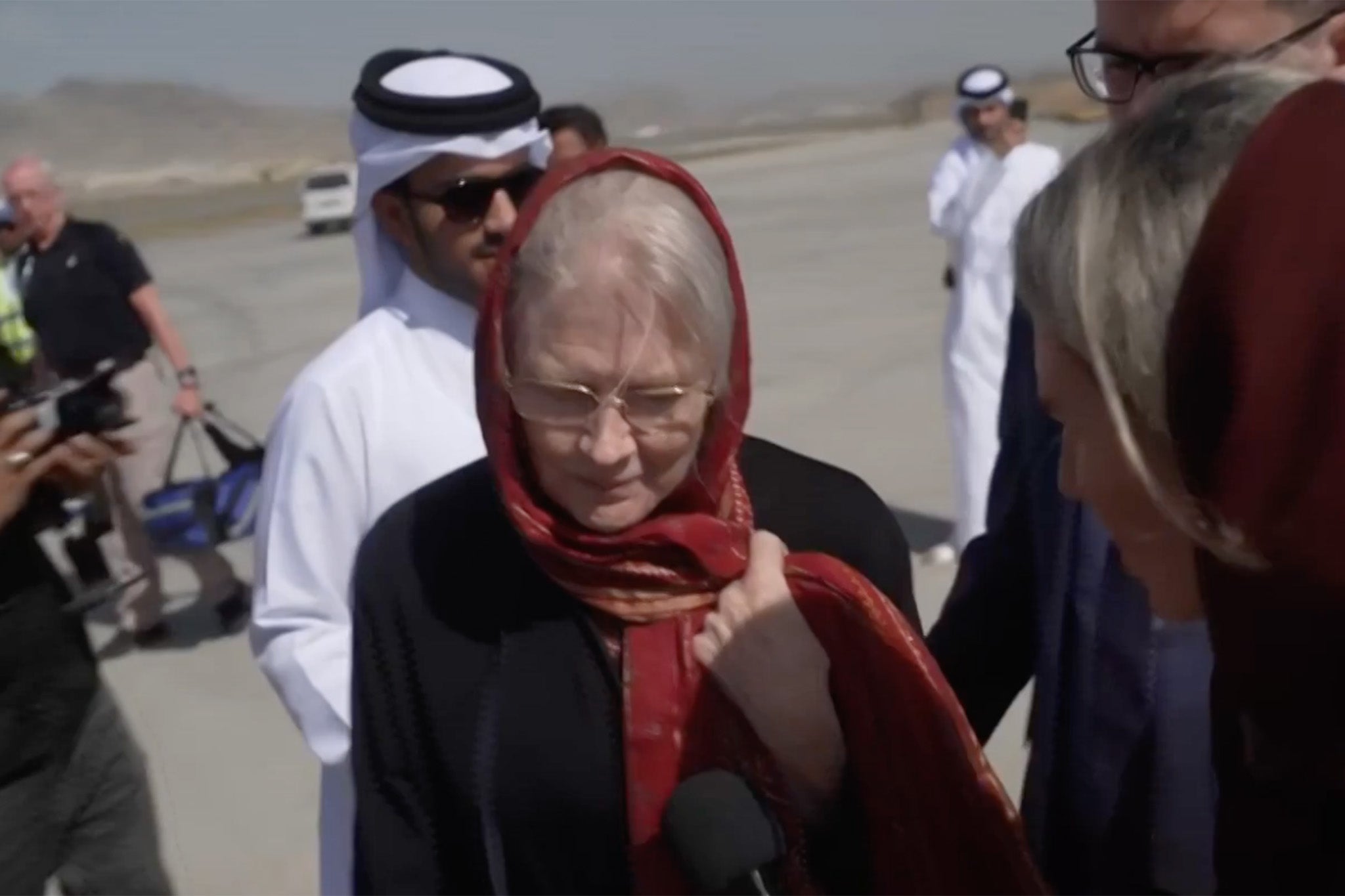 The shots showed that they were on a plane in Kabul after being detained for more than seven months.