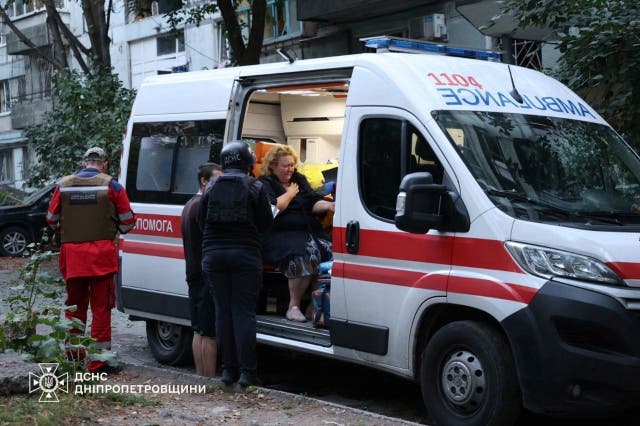 <p>In this photo provided by the Ukrainian Emergency Services on Saturday, Sept. 20, 2025, an injured woman sits in ambulance near a residential house damaged by a Russian strike on Dnipro, Ukraine. (Ukrainian Emergency Service via AP)</p>