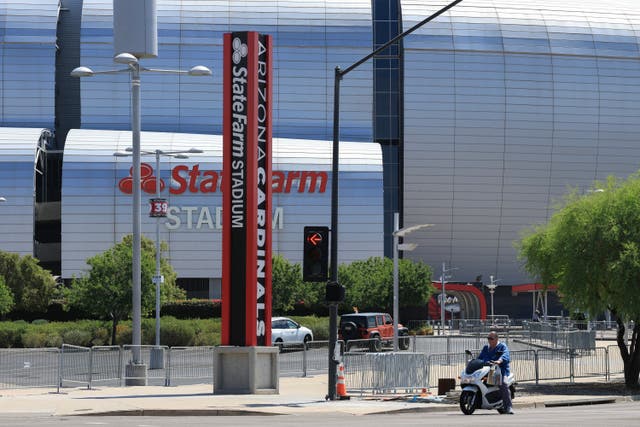<p>An armed man was detained at State Farm Stadium, home of the Arizona Cardinals, ahead of the upcoming memorial service for political activist Charlie Kirk</p>