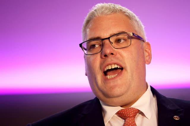 Democratic Unionist Party leader Gavin Robinson delivers his speech at the DUP party conference at the La Mon Hotel in Belfast (Peter Morrison/PA)