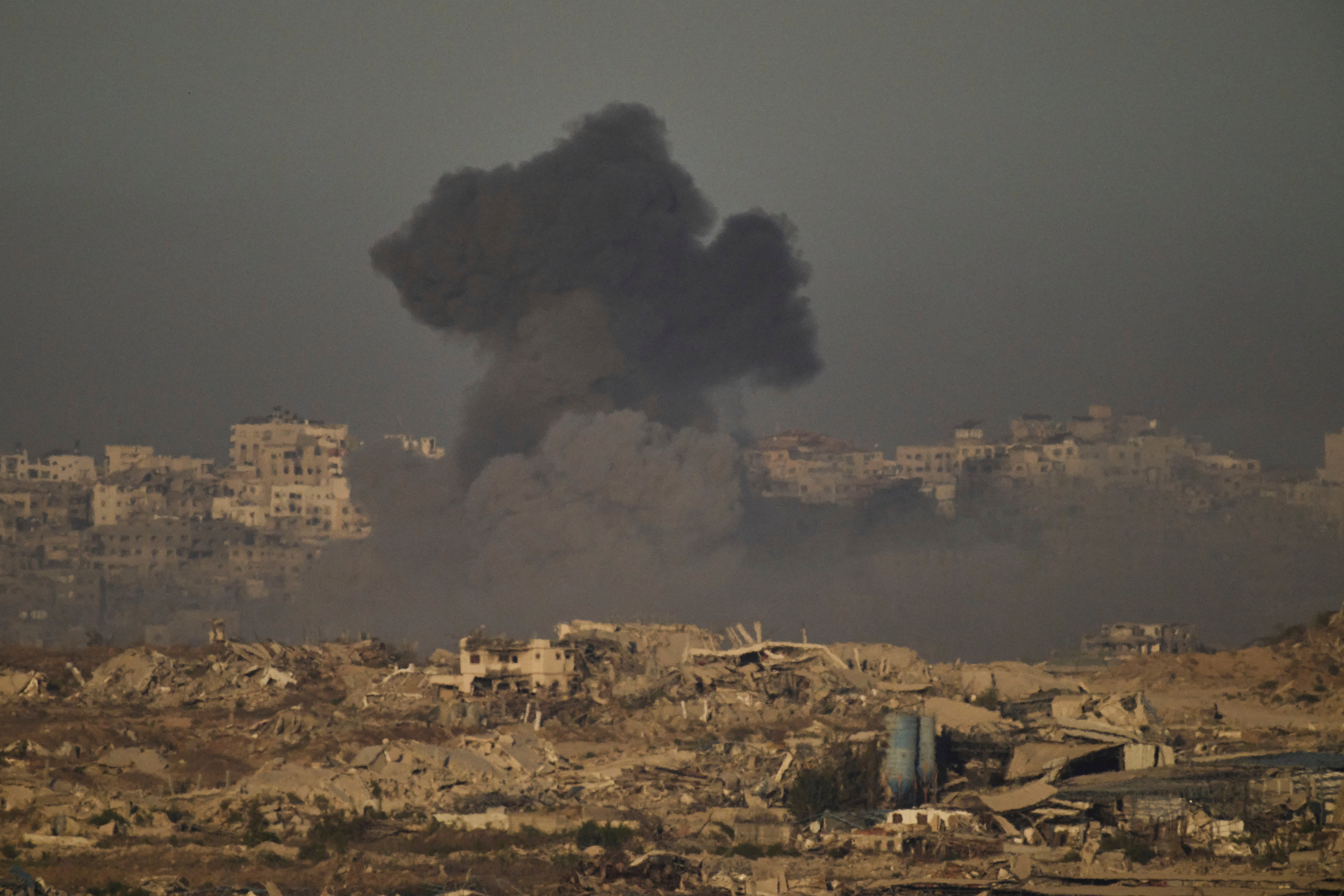 Smoke rises to the sky following an Israeli military strike in the northern Gaza Strip. The Palestinian death toll has surpassed 65,000 since October 2023