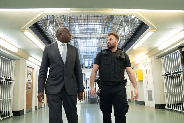 Deputy Prime Minister and Justice Secretary David Lammy meets staff wearing new body armour that will be made available to prison officers and security staff, during a visit to HMP Belmarsh in south-east London (Stefan Rousseau/PA)