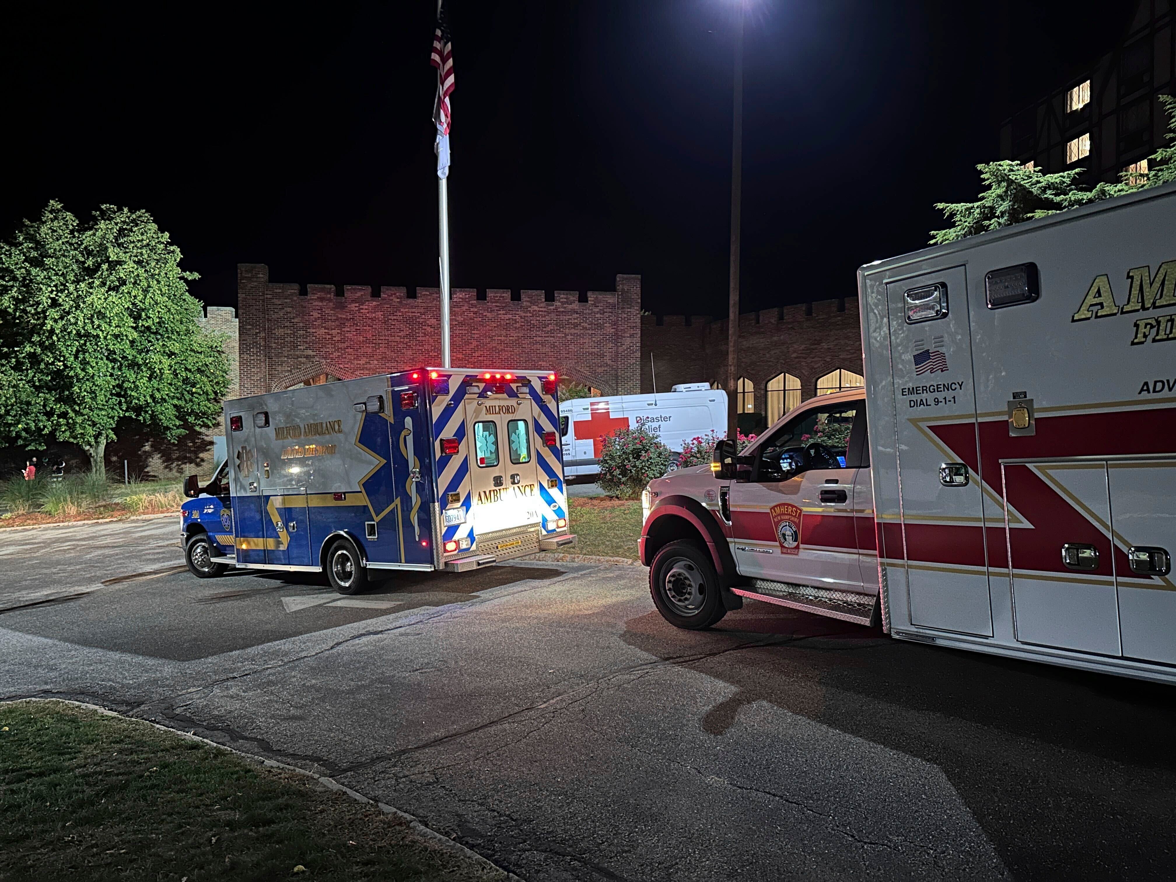<p>Ambulances are parked outside a hotel that is acting as a reunification center after a shooting at a country club in Nashua, New Hampshire, Saturday, Sept. 20, 2025</p>