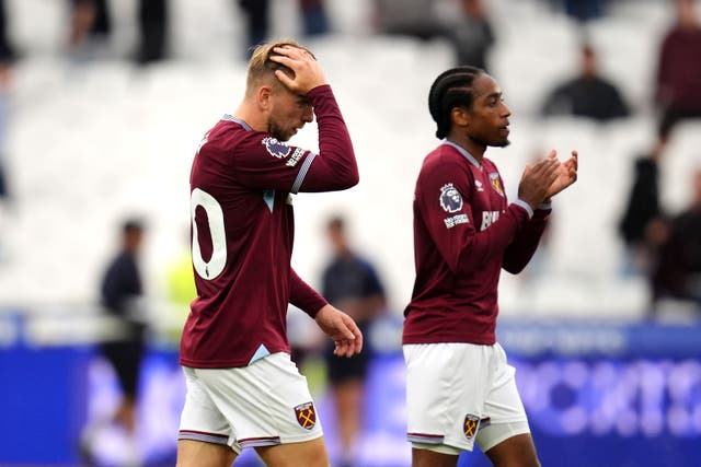 West Ham captain Jarrod Bowen (left) and team-mate Kyle Walker-Peters trudge off after losing 2-1 to Crystal Palace (John Walton/PA).