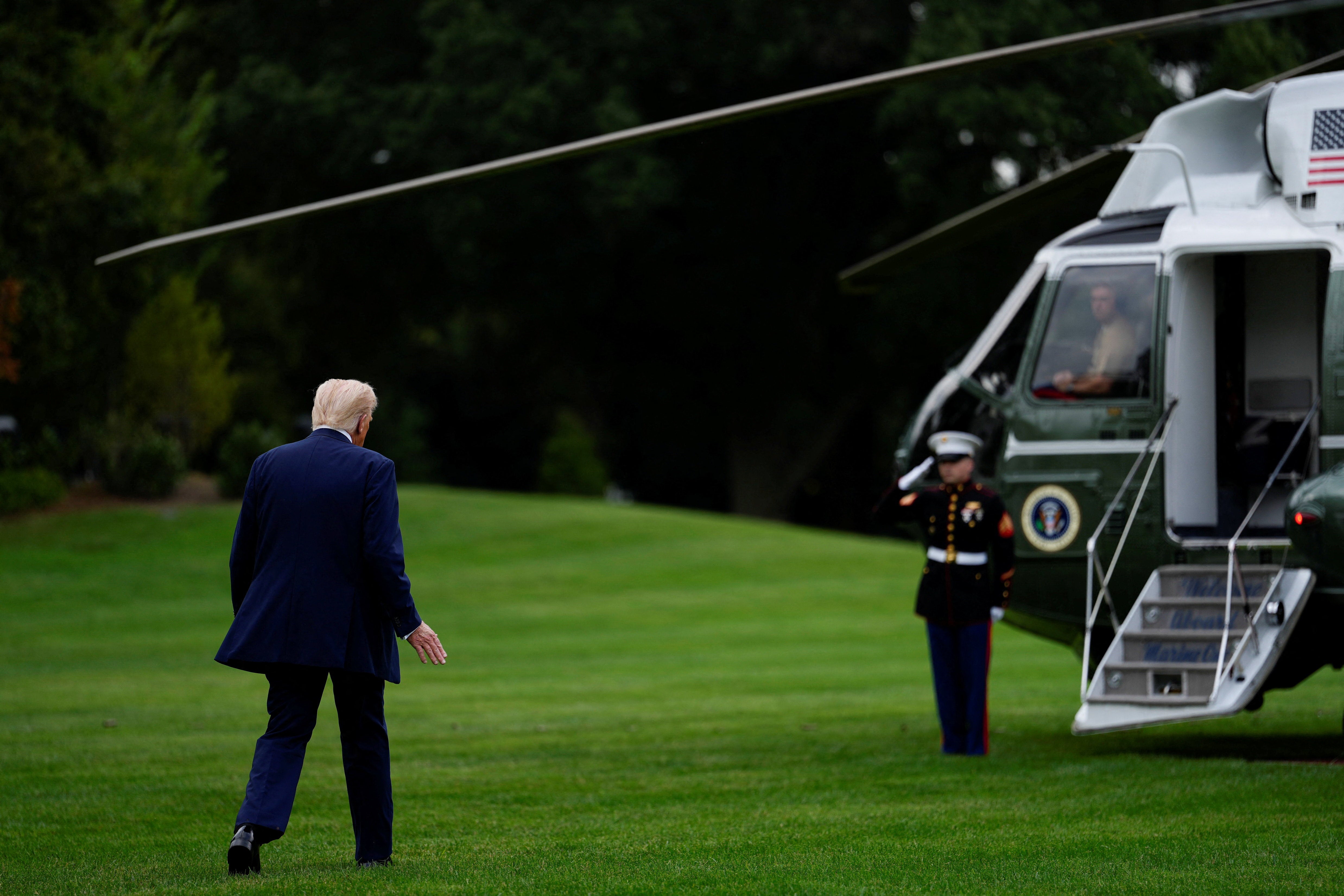 President Donald Trump boards Marine One