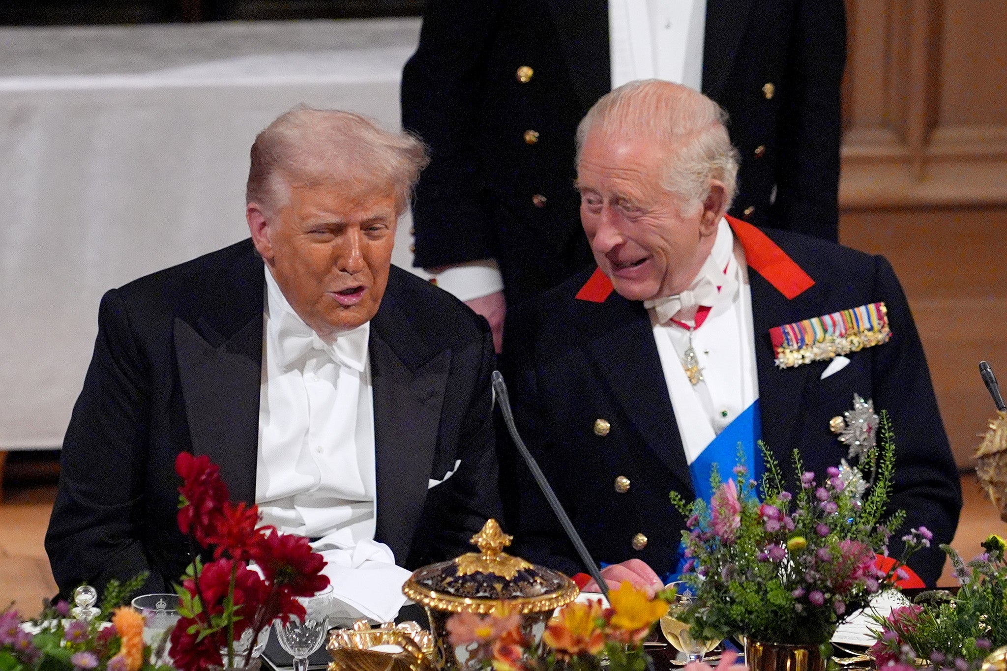 Mr Trump speaks to King Charles during a banquet at Windsor Castle for last week’s state visit