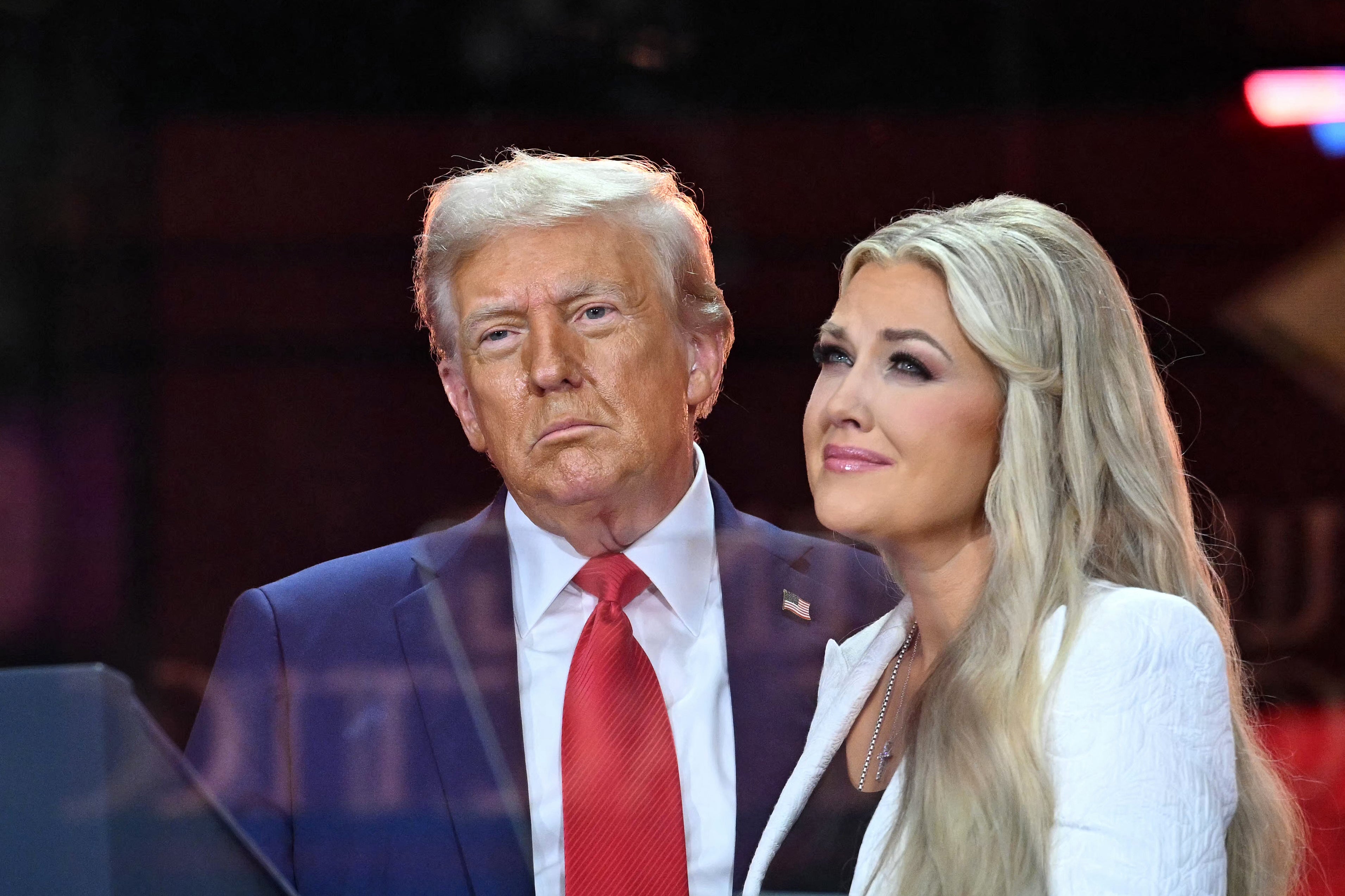 U.S. President Donald Trump greets Erika Kirk, Charlie Kirk's widow, during the public memorial service at State Farm Stadium in Glendale, Arizona, on September 21 2025