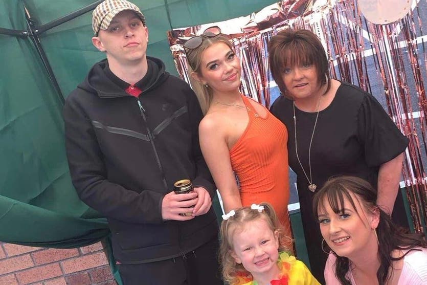 James Borland (left) with his mother Audrey Cameron (rear right) and other family members (Family handout/PA)