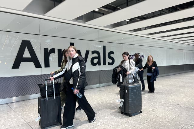 Passengers in the arrivals hall at Heathrow Terminal 5 in London (Maja Smiejkowska/PA)