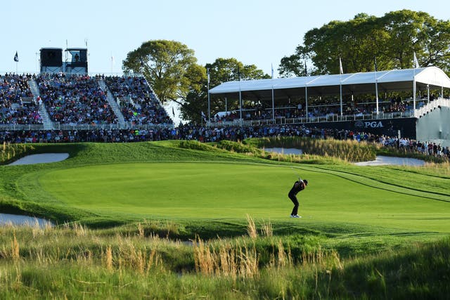 <p>Brooks Koepka playing towards the 18th green at Bethpage Black</p>
