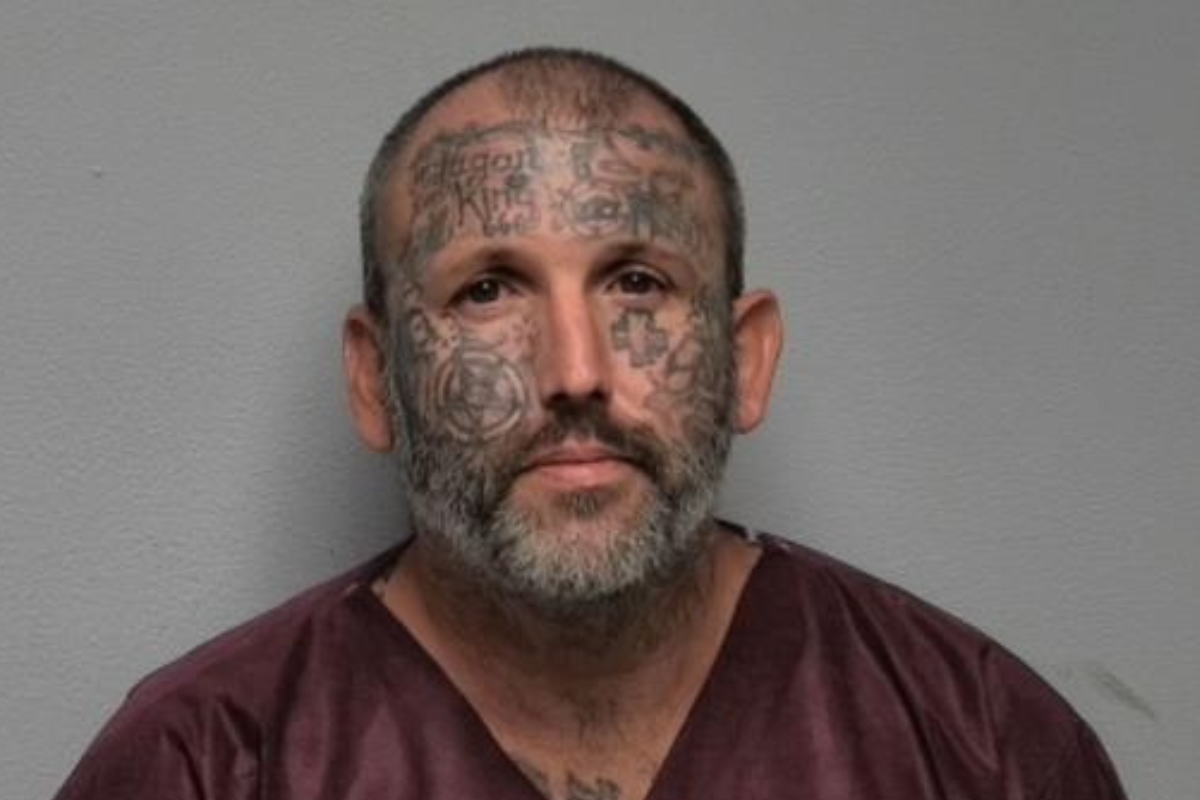 Tattoo-covered suspect accused of murdering mom and daughter served time for killing man and stuffing body in suitcase Tattoo-covered suspect accused of murdering mom and daughter served time for killing man and stuffing body in suitcase