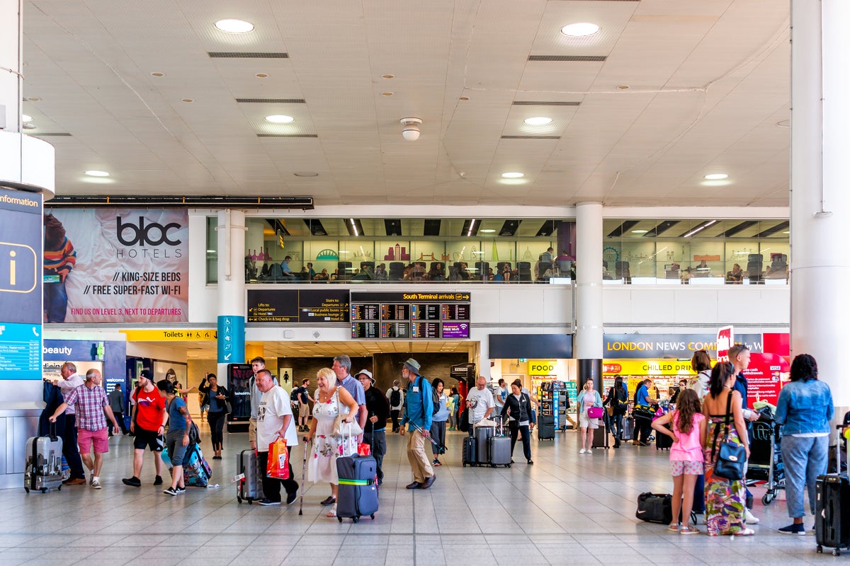 Man stole bags from breastfeeding mother at Gatwick Airport before using head to break barrier