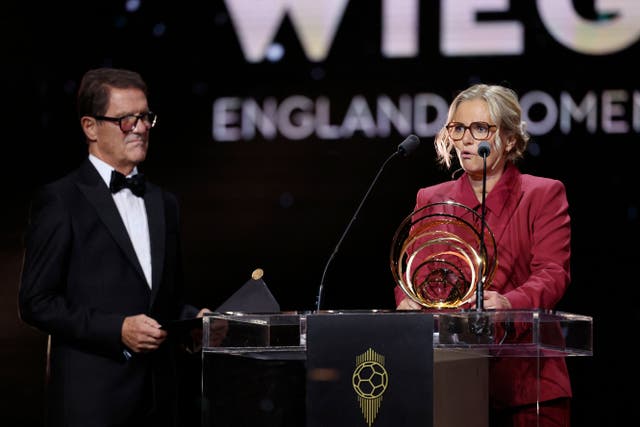 <p>Sarina Wiegman received the Johan Cruyff trophy from Fabio Capello</p>