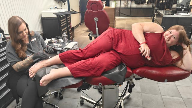 <p>First-time Virgin Voyages cruiser Natalie gets inked at sea</p>