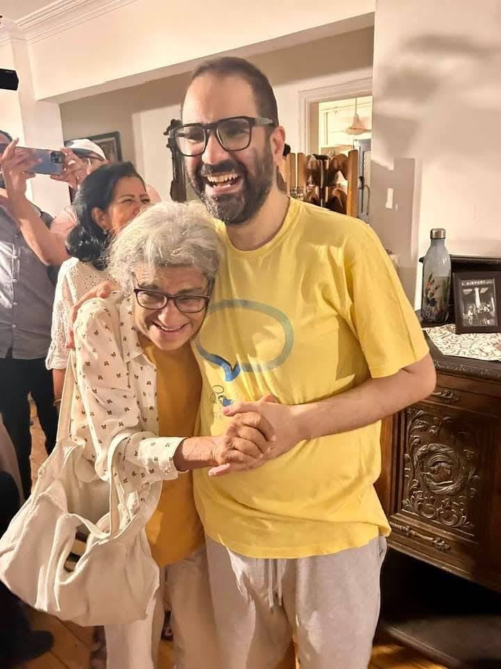 Alaa after he was freed on Tuesday, embracing his mother Laila who nearly died campaigning for his release