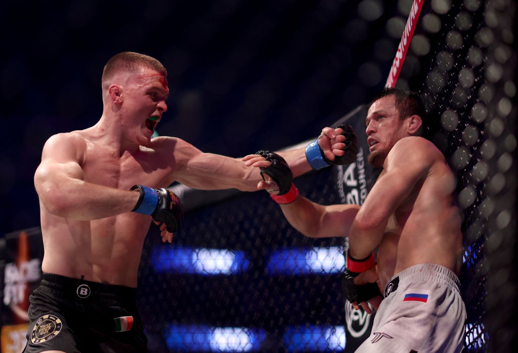 Paul Hughes (left) took undefeated champion Usman Nurmagomedov to the limit in their first fight