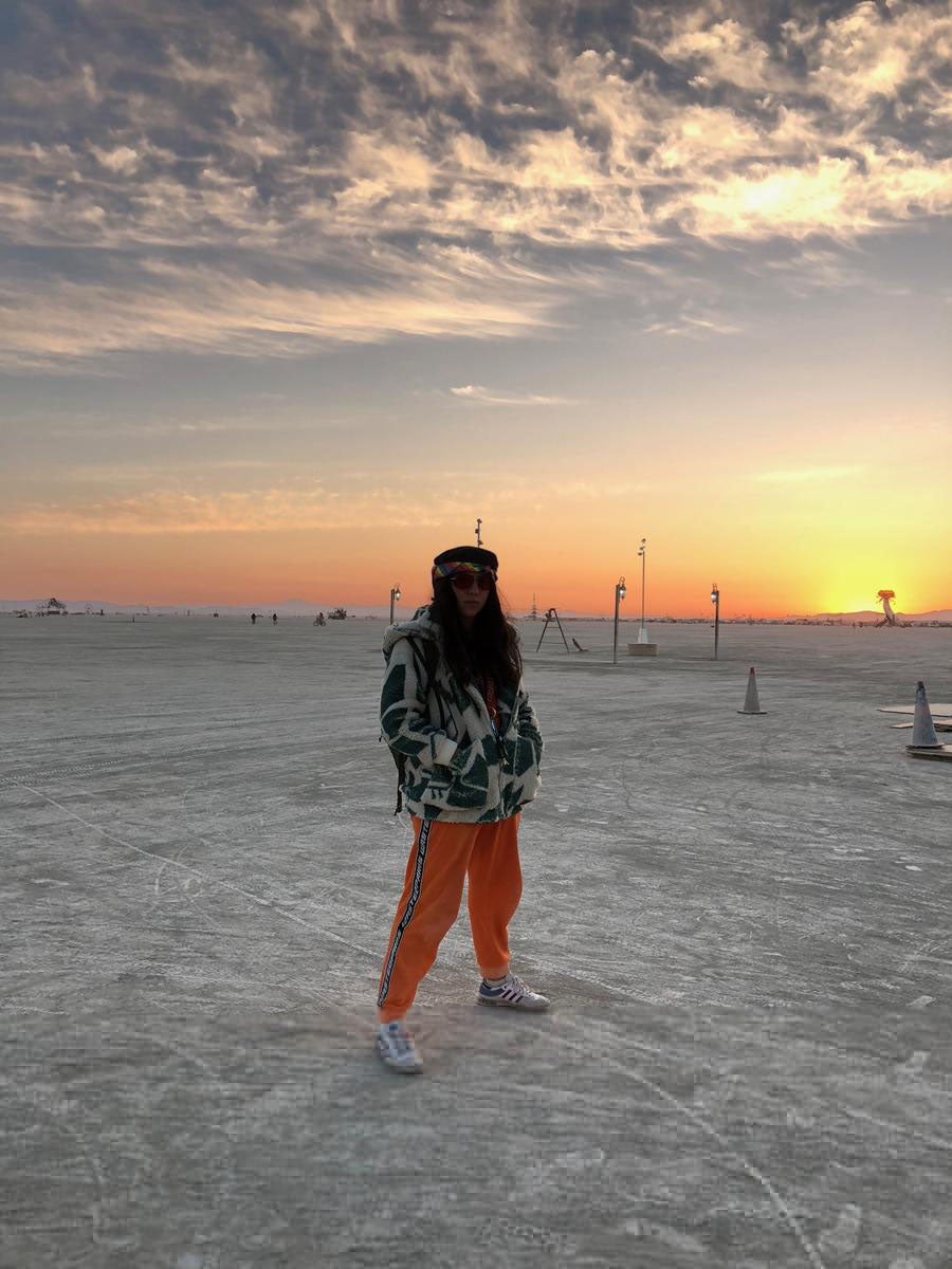 Cloe Callet traveled to Burning Man, but her presence was unpaid