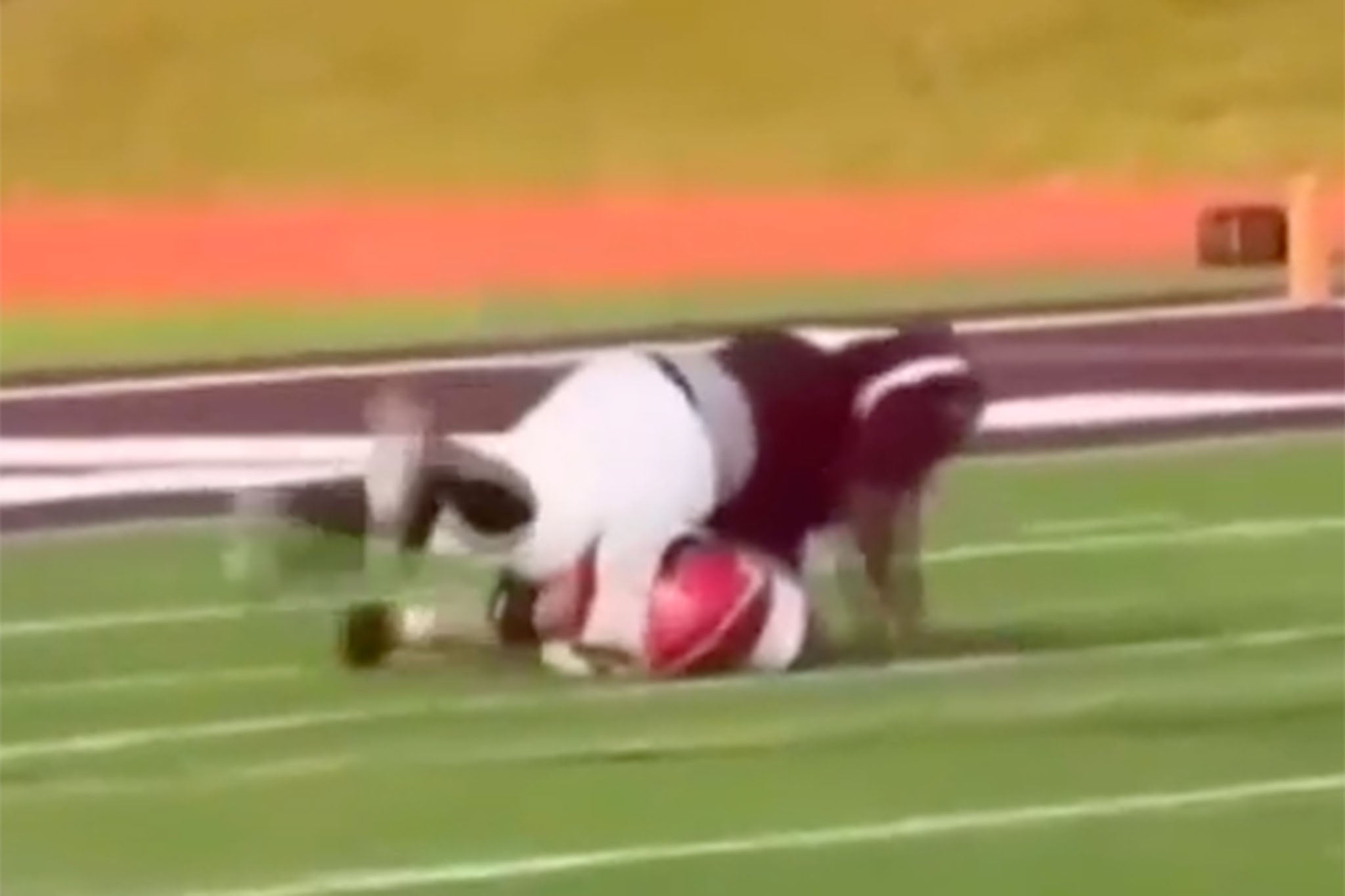A Kalamazoo player was filmed jumping on top of a rival Lakeshore player, shattering the vertebrae in his lower back