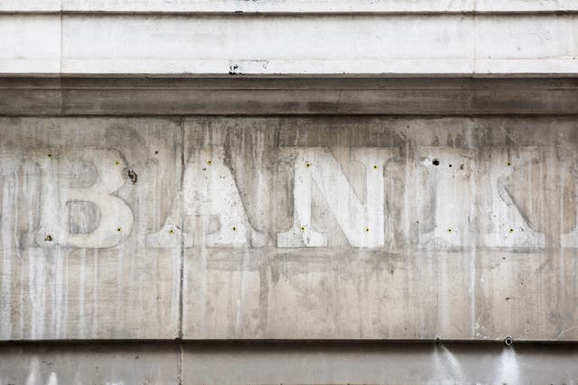 The report highlighted concerns over the closure of banks in NI (Matt Crossick/PA)