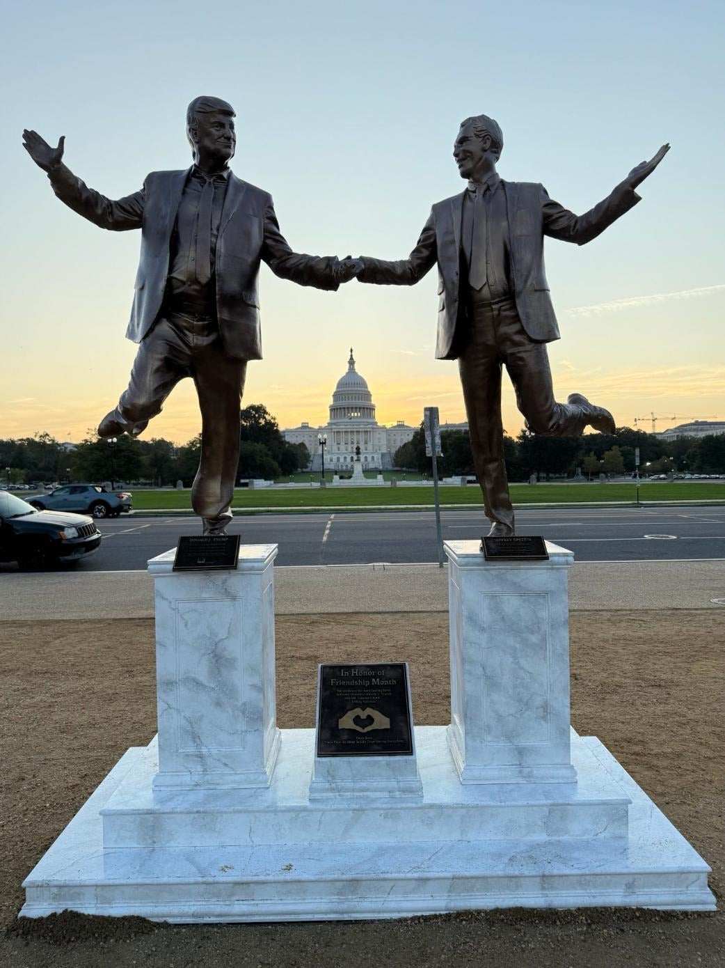Statue of Donald Trump and Jeffrey Epstein holding hands crops up on the National Mall during Friendship Month