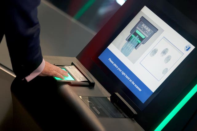 An identity and fingerprint terminal is used during a preview of the newly developed entry exit system zone at the Eurotunnel terminal (Gareth Fuller/PA)