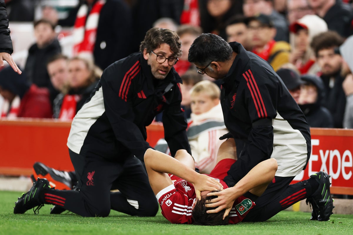 Giovanni Leoni set for several months out as Liverpool defender suspects serious knee injury
