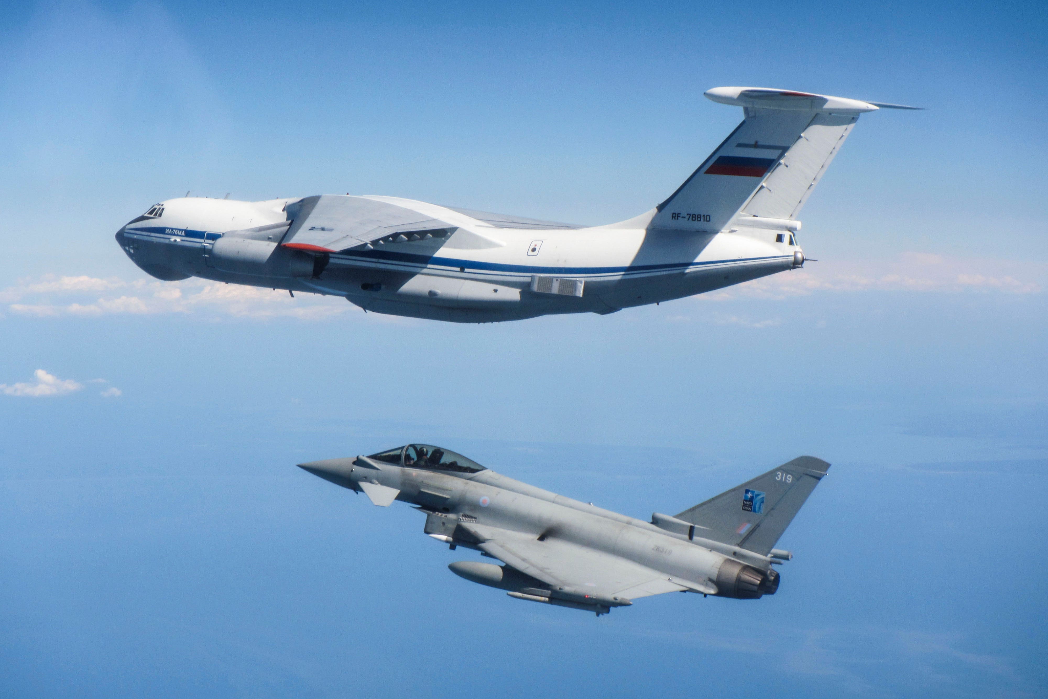 A Royal Air Force Typhoon fighter jet intercepts a Russian military transport aircraft
