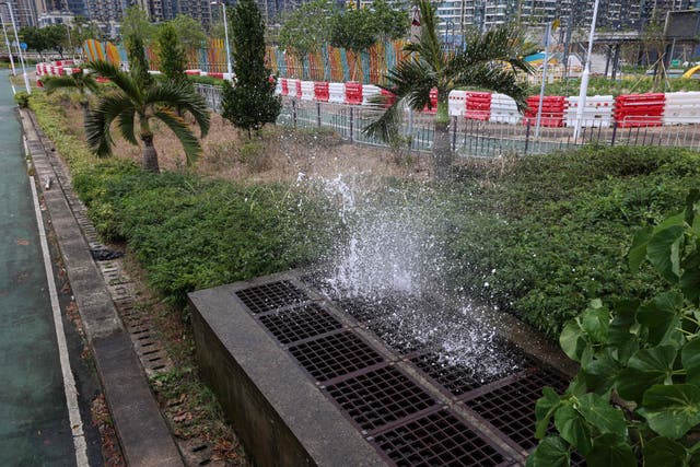 Seawater-gushes-from-a-drainage-outlet-as-storm-surge-from-Super-Typhoon-Ragasa-causes-backflow-floo.jpeg