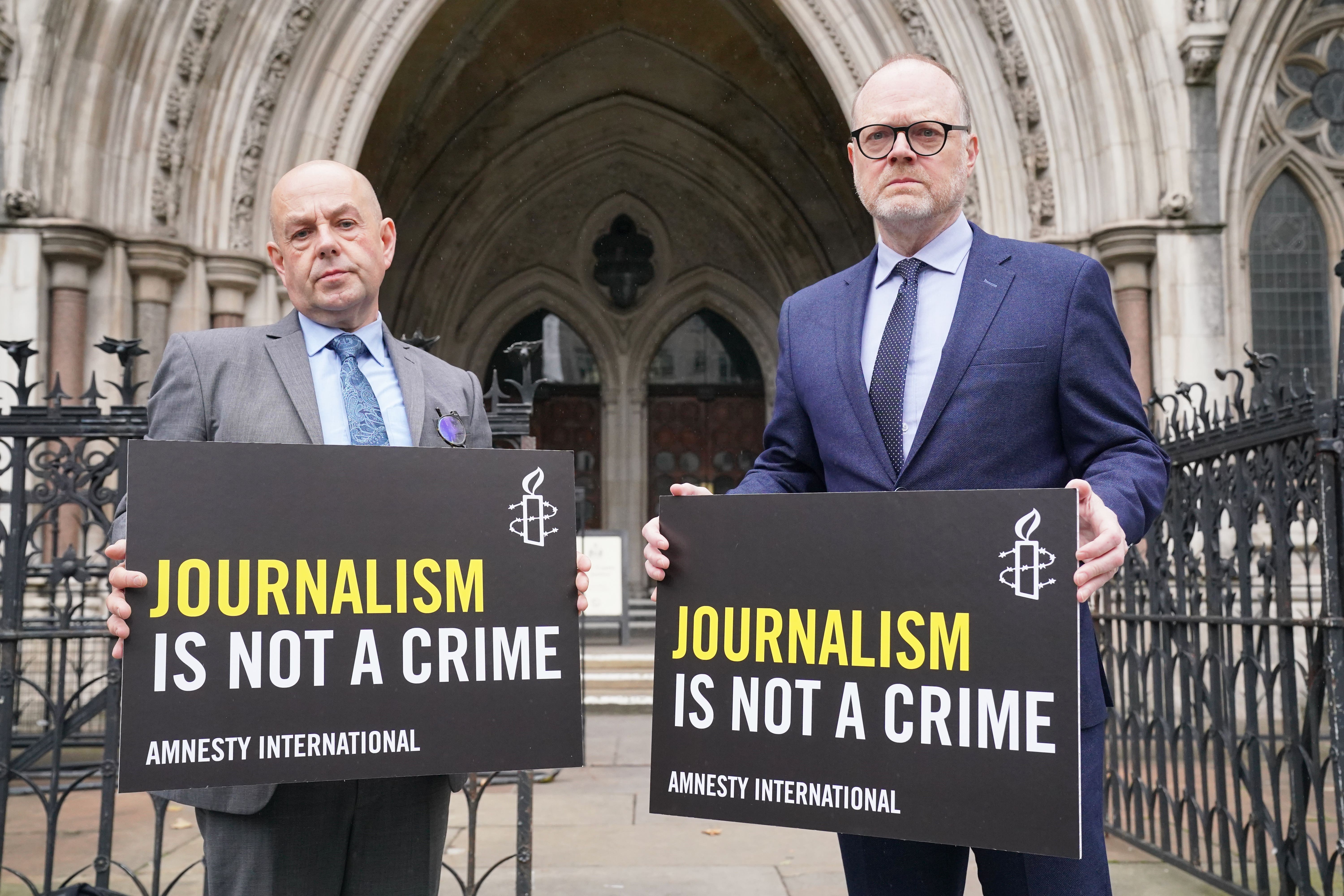 Journalists Barry McCaffrey and Trevor Birney outside the Royal Courts of Justice, in London, after the Investigatory Powers Tribunal (IPT) held a four-day hearing in the case brought by the Northern Ireland-based filmmakers over claims they were secretly monitored by police (PA)