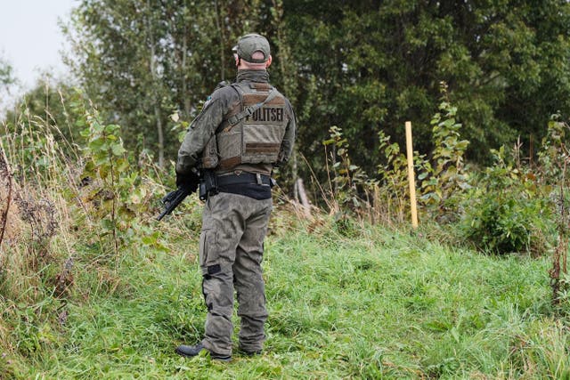 <p>An Estonian border guard patrols the Russian border near Vinski, Estonia</p>