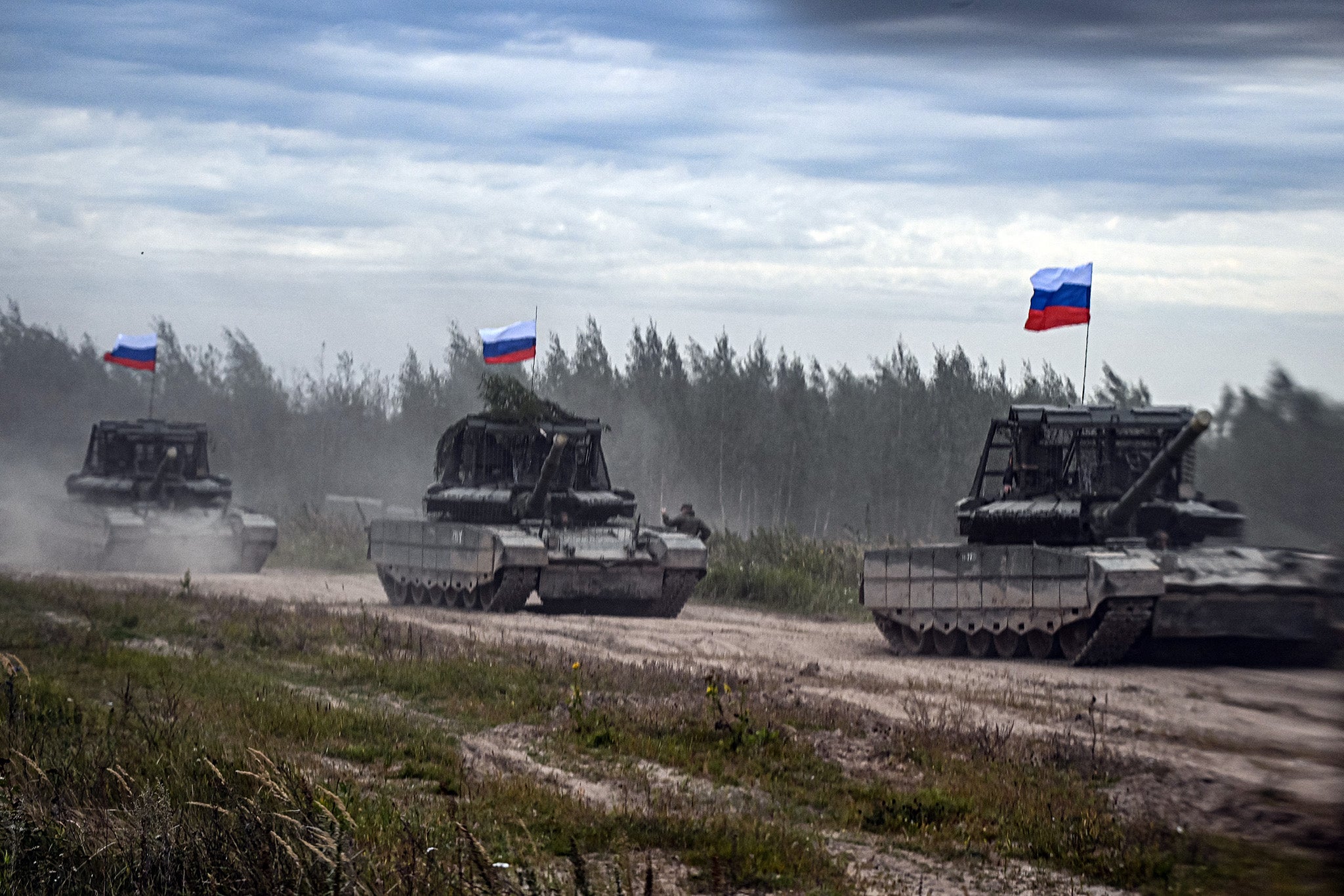 Russian tanks move during the