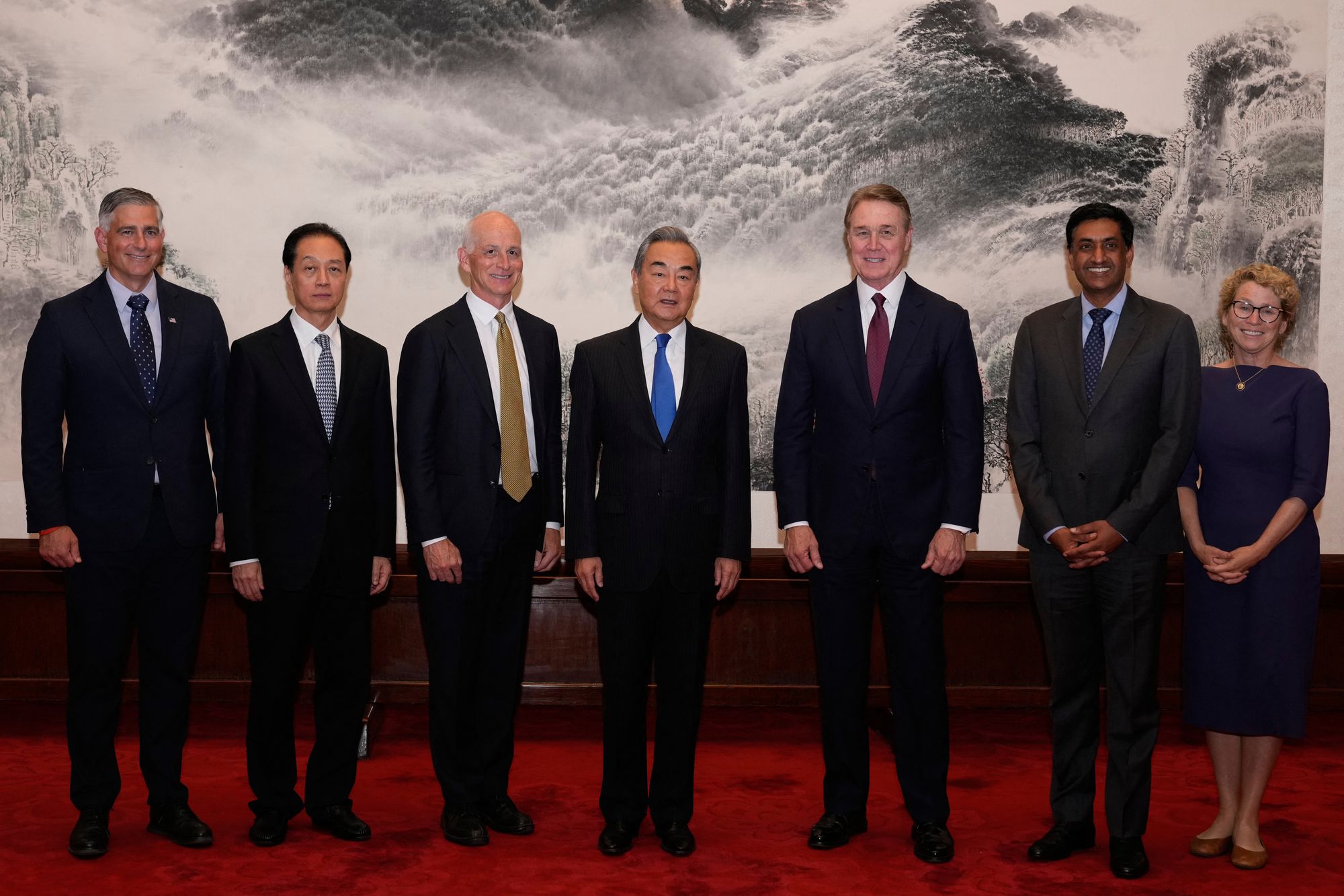 <p>Chinese foreign minister Wang Yi  with the visiting US lawmakers at the Great Hall of the People in Beijing</p>