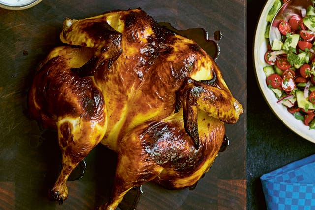 <p>Marinated overnight in saffron, yoghurt and lime, this roast chicken is Nosrat’s take on the Persian joojeh kabob of her childhood</p>
