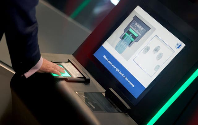 <p>An identity and fingerprint terminal is used during a preview of the newly developed Entry Exit System (EES) zone at the Eurotunnel terminal in Folkestone, Kent</p>