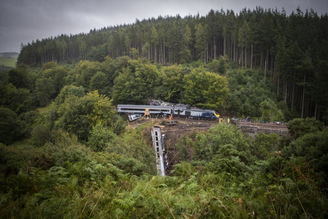 The derailment happened during bad weather in August 2020 (Jane Barlow/PA)