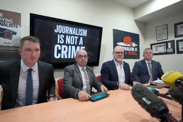Solicitor John Finnucane, journalists Barry McCaffrey and Trevor Birney, and solicitor Niall Murphy (Niall Carson/PA)