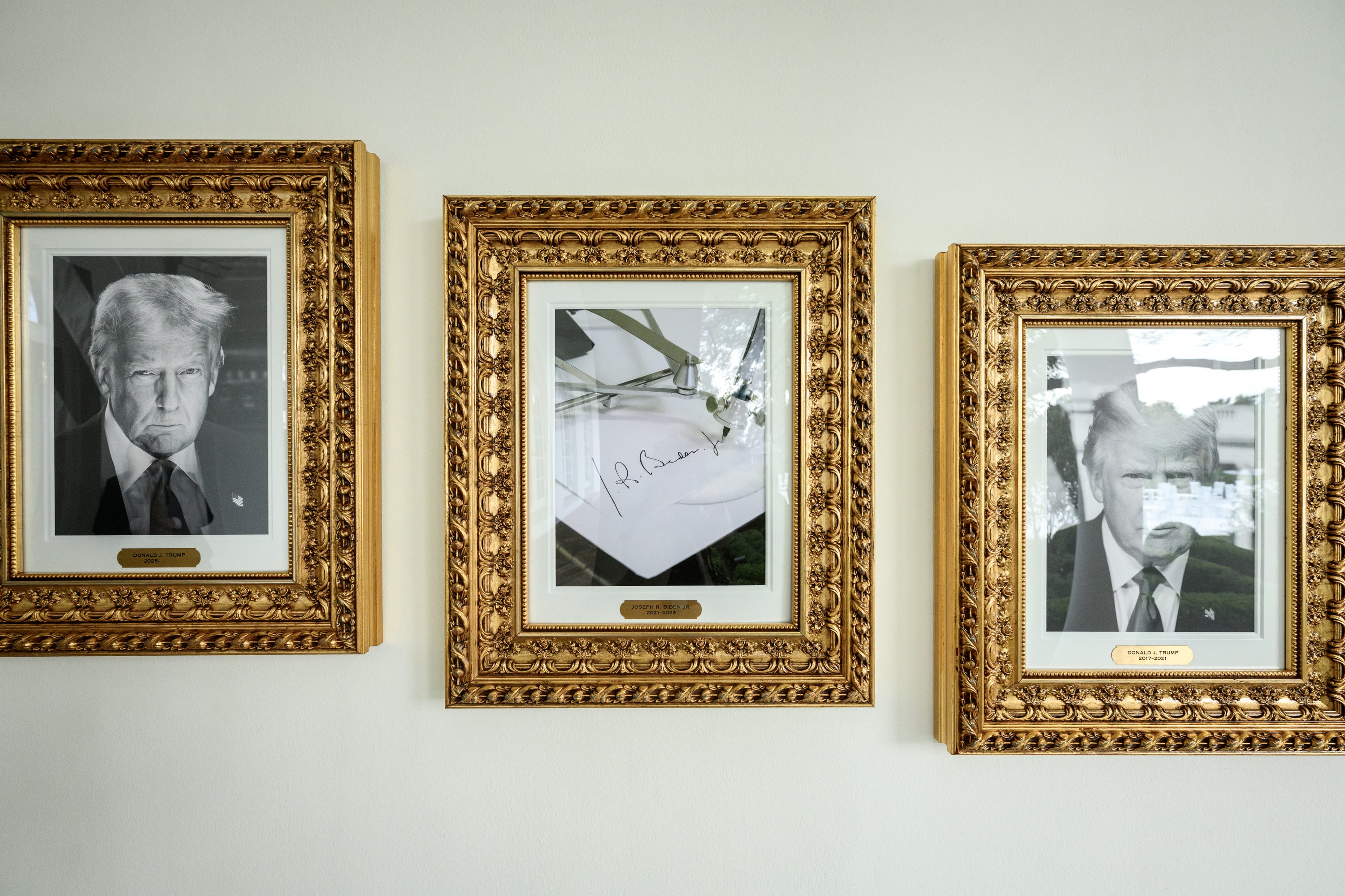 This photograph depicts former president Joe Biden's omission from President Donald Trump's "wall of fame" on the outside of the White House